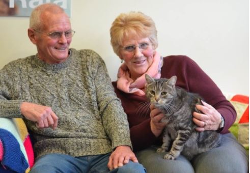 Richard and Barbara Ray reunited with their silver tabby Misty,  age 12.