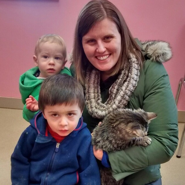 Hope's new family: Ethan and Cameron, their mom Erin, and the kitten Hope