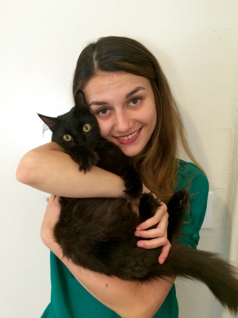 George the cat (with owner by Mila Rusafova pictured) was rescued after darting onto the A/C/E/ subway tracks at canal Street on July 22, 2015. Photo credit submitted by Mila Rusafova/ NY Post