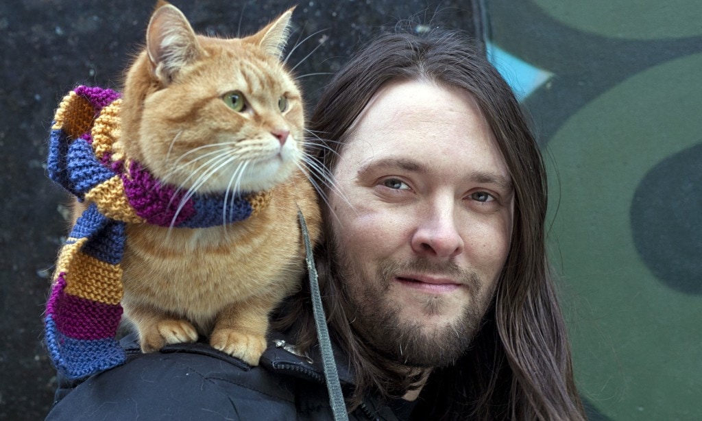 James Bowen, author, with Bob the street cat
